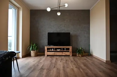 Telewizja i/lub zestaw kina domowego w obiekcie Apartament Podmiejska
