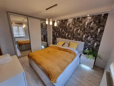 Łóżko lub łóżka w pokoju w obiekcie Fany
