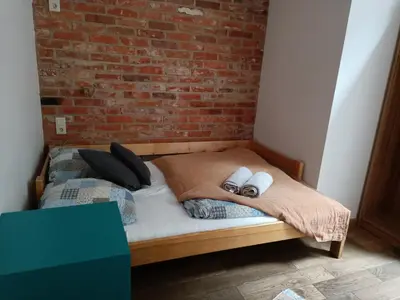 Łóżko lub łóżka w pokoju w obiekcie Villa Hubertus