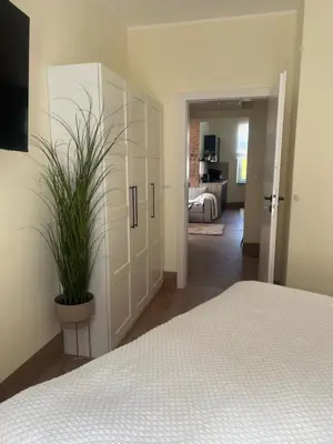 Łóżko lub łóżka w pokoju w obiekcie Apartament w sercu miasta
