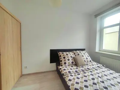 Łóżko lub łóżka w pokoju w obiekcie Sunny Stay by Grafit