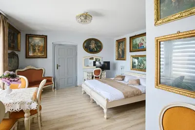 Łóżko lub łóżka w pokoju w obiekcie Apartamenty Pod Kalwarią Góra Św Anny