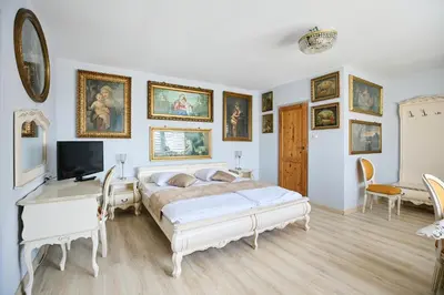 Łóżko lub łóżka w pokoju w obiekcie Apartamenty Pod Kalwarią Góra Św Anny
