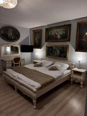 Łóżko lub łóżka w pokoju w obiekcie Apartamenty Pod Kalwarią Góra Św Anny