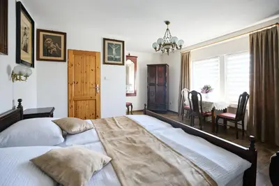 Łóżko lub łóżka w pokoju w obiekcie Apartamenty Pod Kalwarią Góra Św Anny