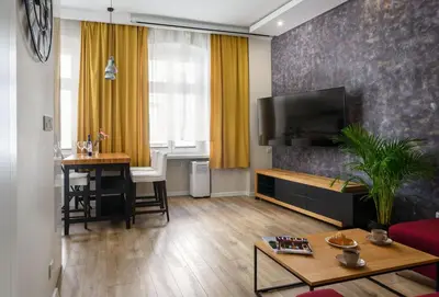 Telewizja i/lub zestaw kina domowego w obiekcie Old Town Apartment Włodkowica 27 - ProperUNIT