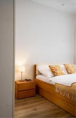 Łóżko lub łóżka w pokoju w obiekcie Old Town Apartment Włodkowica 27 - ProperUNIT