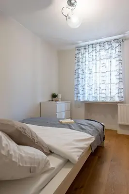 Łóżko lub łóżka w pokoju w obiekcie Route 66 Apartment Old Town - ProperUNIT