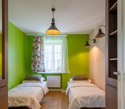 Łóżko lub łóżka w pokoju w obiekcie Route 66 Apartment Old Town - ProperUNIT