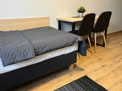 Łóżko lub łóżka w pokoju w obiekcie Hotel Leśny