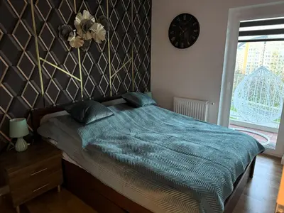 Łóżko lub łóżka w pokoju w obiekcie Apartament Urokliwy Zakątek Wałbrzych