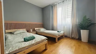 Łóżko lub łóżka w pokoju w obiekcie Apartament Słoneczny 14