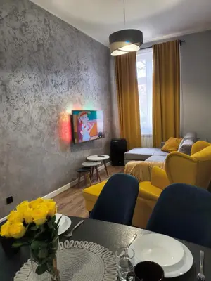 Telewizja i/lub zestaw kina domowego w obiekcie Tabago Studio 32 Brzeg Wolności