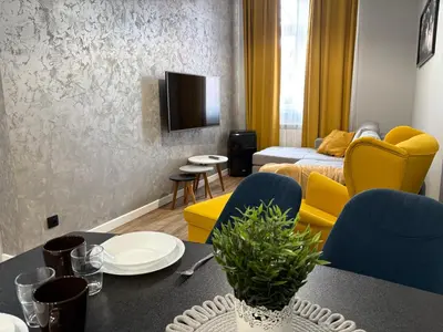 Telewizja i/lub zestaw kina domowego w obiekcie Tabago Studio 32 Brzeg Wolności