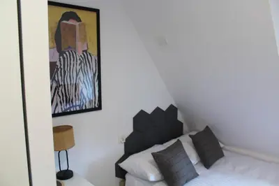 Łóżko lub łóżka w pokoju w obiekcie Mini AP Apartment's