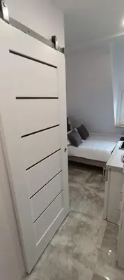 Łóżko lub łóżka w pokoju w obiekcie Mini AP Apartment's