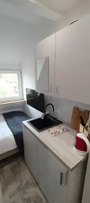 Łóżko lub łóżka w pokoju w obiekcie Mini AP Apartment's
