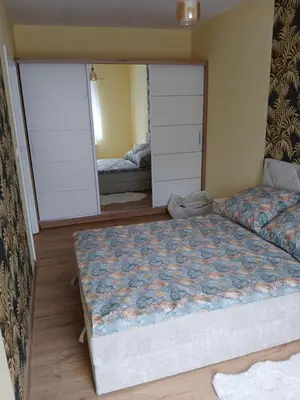 Łóżko lub łóżka w pokoju w obiekcie Kolejowa City