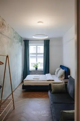 Łóżko lub łóżka w pokoju w obiekcie Apartament Rynek Ruska