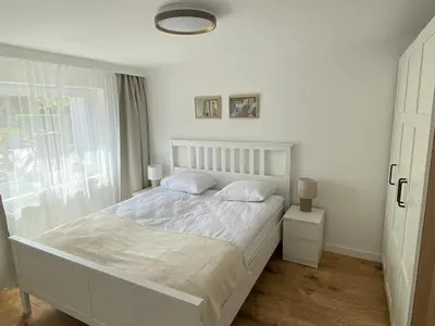 Łóżko lub łóżka w pokoju w obiekcie Apartamenty Toronto