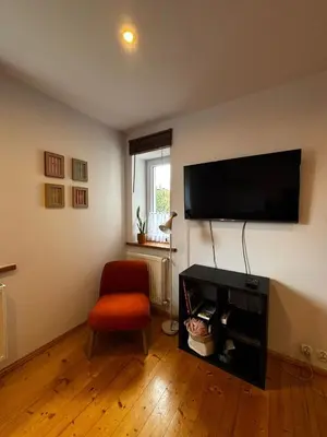 Telewizja i/lub zestaw kina domowego w obiekcie Apartament Na Słowaka