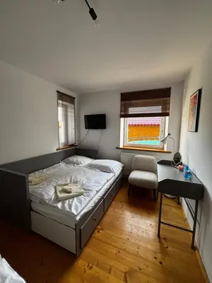 Łóżko lub łóżka w pokoju w obiekcie Apartament Na Słowaka