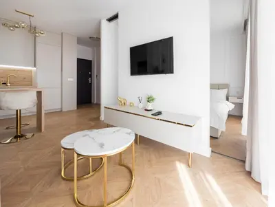 Telewizja i/lub zestaw kina domowego w obiekcie Virgin River Deluxe Apartment by BookingHost