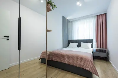 Łóżko lub łóżka w pokoju w obiekcie Apartamenty SOWIE SZCZYTY