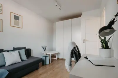 Część wypoczynkowa w obiekcie Mieszczańska 46 - Nowoczesny apartament z 2 sypialniami - taras, parking, centrum - Wrocław - Fair Rentals