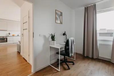 Kuchnia lub aneks kuchenny w obiekcie Mieszczańska 46 - Nowoczesny apartament z 2 sypialniami - taras, parking, centrum - Wrocław - Fair Rentals