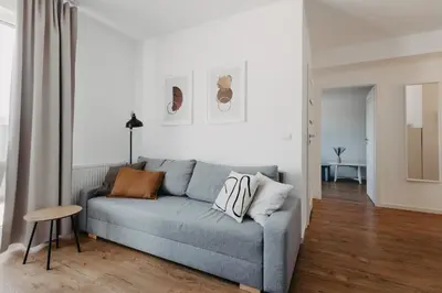 Część wypoczynkowa w obiekcie Mieszczańska 46 - Nowoczesny apartament z 2 sypialniami - taras, parking, centrum - Wrocław - Fair Rentals