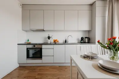 Kuchnia lub aneks kuchenny w obiekcie Mieszczańska 46 - Nowoczesny apartament z 2 sypialniami - taras, parking, centrum - Wrocław - Fair Rentals