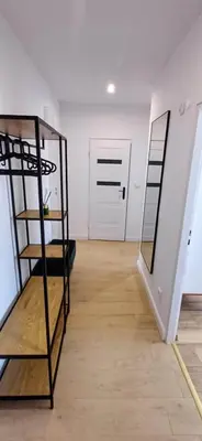 Łóżko lub łóżka w pokoju w obiekcie ApartamentStronieŚląskie