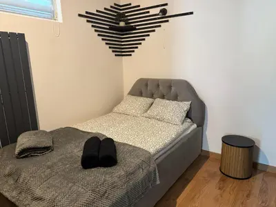 Łóżko lub łóżka w pokoju w obiekcie Apartament Zimowa 16