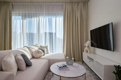 Telewizja i/lub zestaw kina domowego w obiekcie River Premium Apartment C