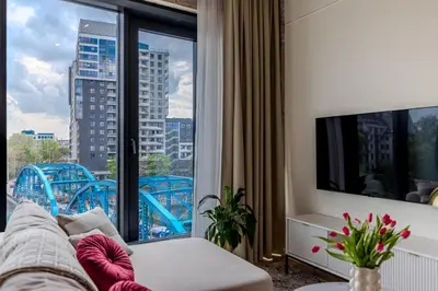 Telewizja i/lub zestaw kina domowego w obiekcie River Premium Apartment C