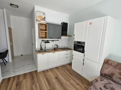 Kuchnia lub aneks kuchenny w obiekcie MADALINSKIEGO Apartament 47