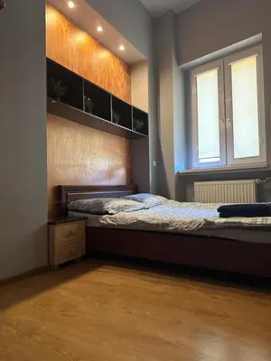 Łóżko lub łóżka w pokoju w obiekcie Tripoli 5