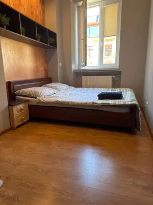 Łóżko lub łóżka w pokoju w obiekcie Tripoli 5