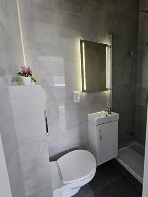 Łazienka w obiekcie Rooms Hop To Wrocław