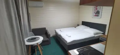 Łóżko lub łóżka w pokoju w obiekcie Bajkowa Przystań