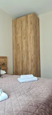 Łóżko lub łóżka w pokoju w obiekcie Aparthotel Apartamenty Czarna Góra 134
