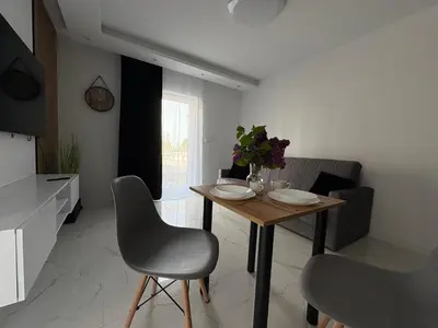 Telewizja i/lub zestaw kina domowego w obiekcie Tabago Studio 33 Brzeg Ofiar Katynia
