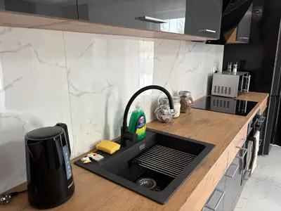 Kuchnia lub aneks kuchenny w obiekcie Tabago Studio 33 Brzeg Ofiar Katynia