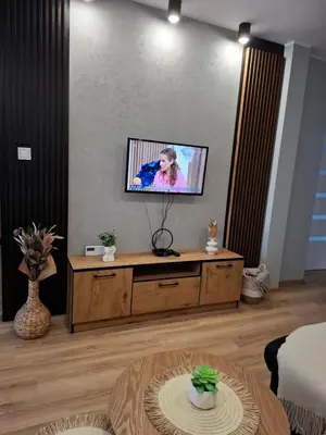 Telewizja i/lub zestaw kina domowego w obiekcie Przy lesie