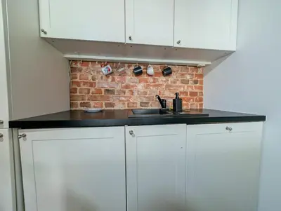 Kuchnia lub aneks kuchenny w obiekcie Rynek Wrocław Serenity Apartment by BookingHost