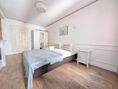 Łóżko lub łóżka w pokoju w obiekcie Rynek Wrocław Serenity Apartment by BookingHost