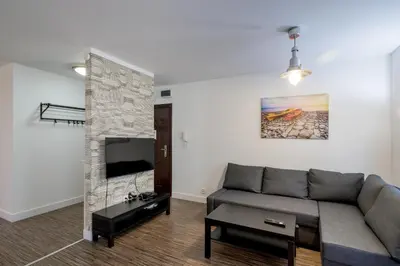 Część wypoczynkowa w obiekcie RentPlanet - Apartament Pułaskiego II