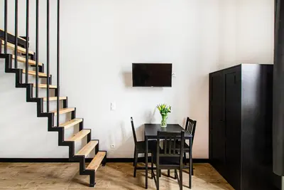 Telewizja i/lub zestaw kina domowego w obiekcie 3B Loft City Apartment