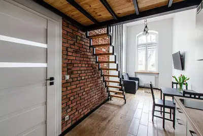 Telewizja i/lub zestaw kina domowego w obiekcie 3A Loft City Centre Apartment